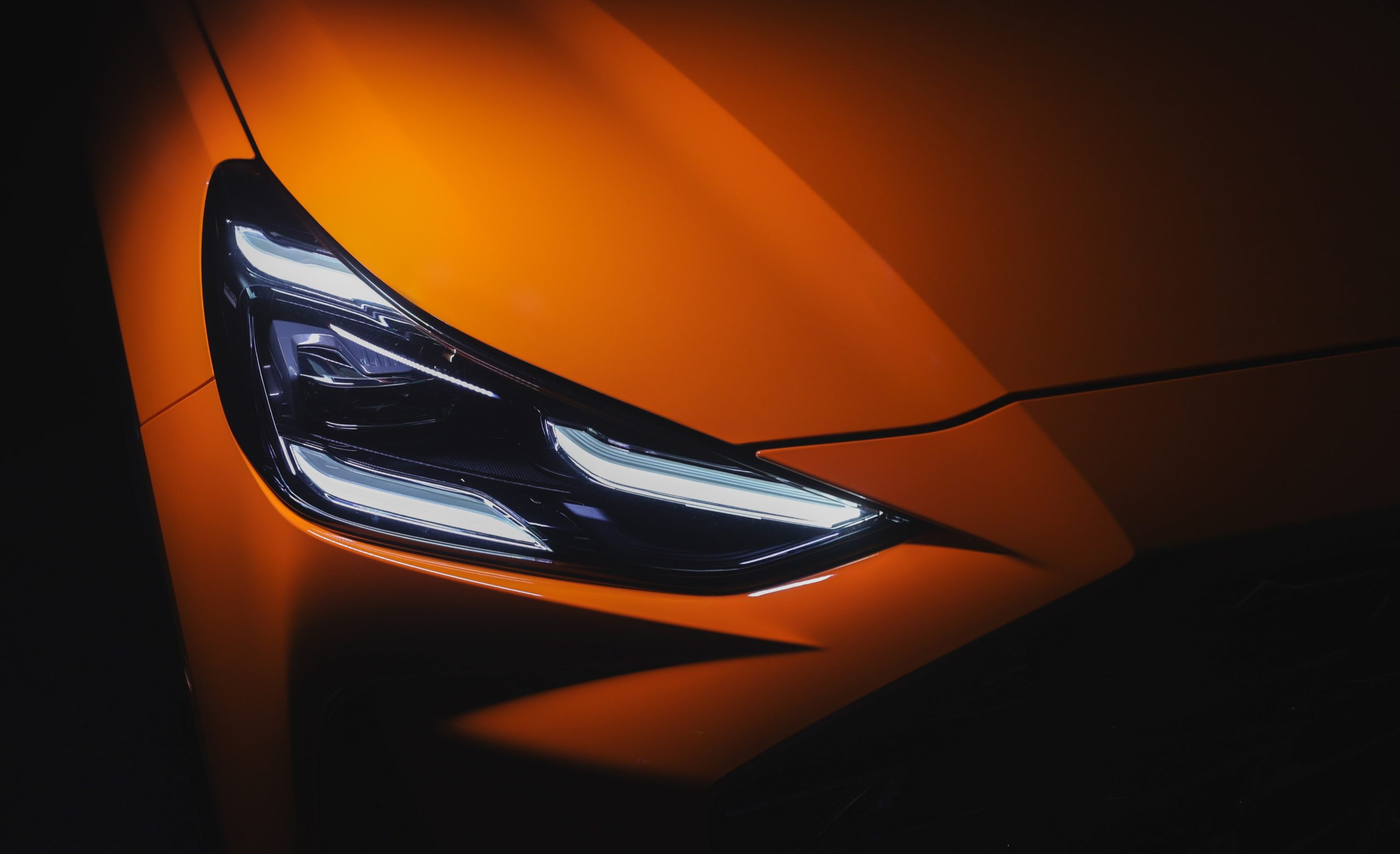 Image of closeup of LED Running Daytime Running Lamps of orange MG One