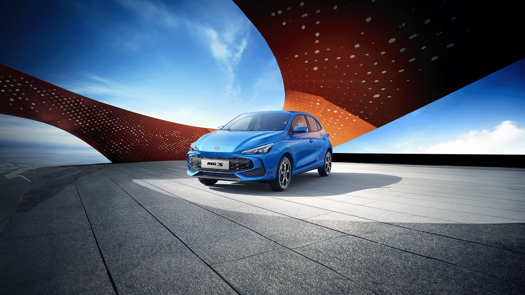 Image of a blue MG 3 parked outdoors.
