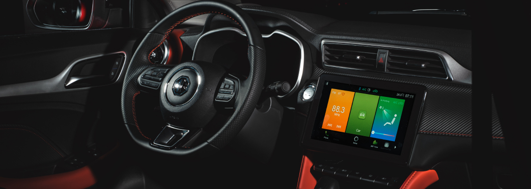 Image of the black leather interior with leather steering wheel and 10 inch floating  touchscreen of the MG ZS.