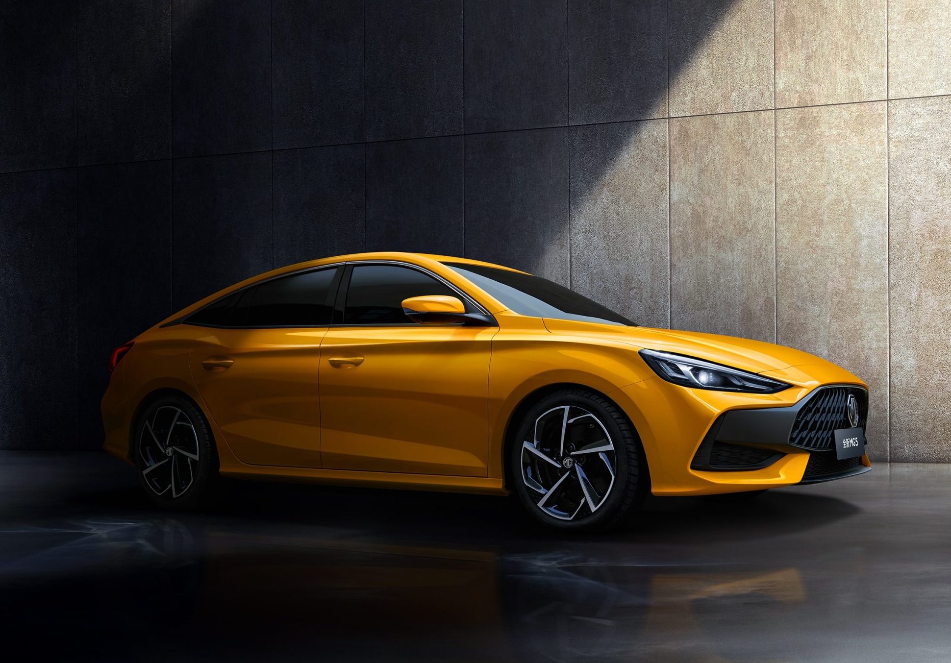 Image of yellow MG GT facing to the left