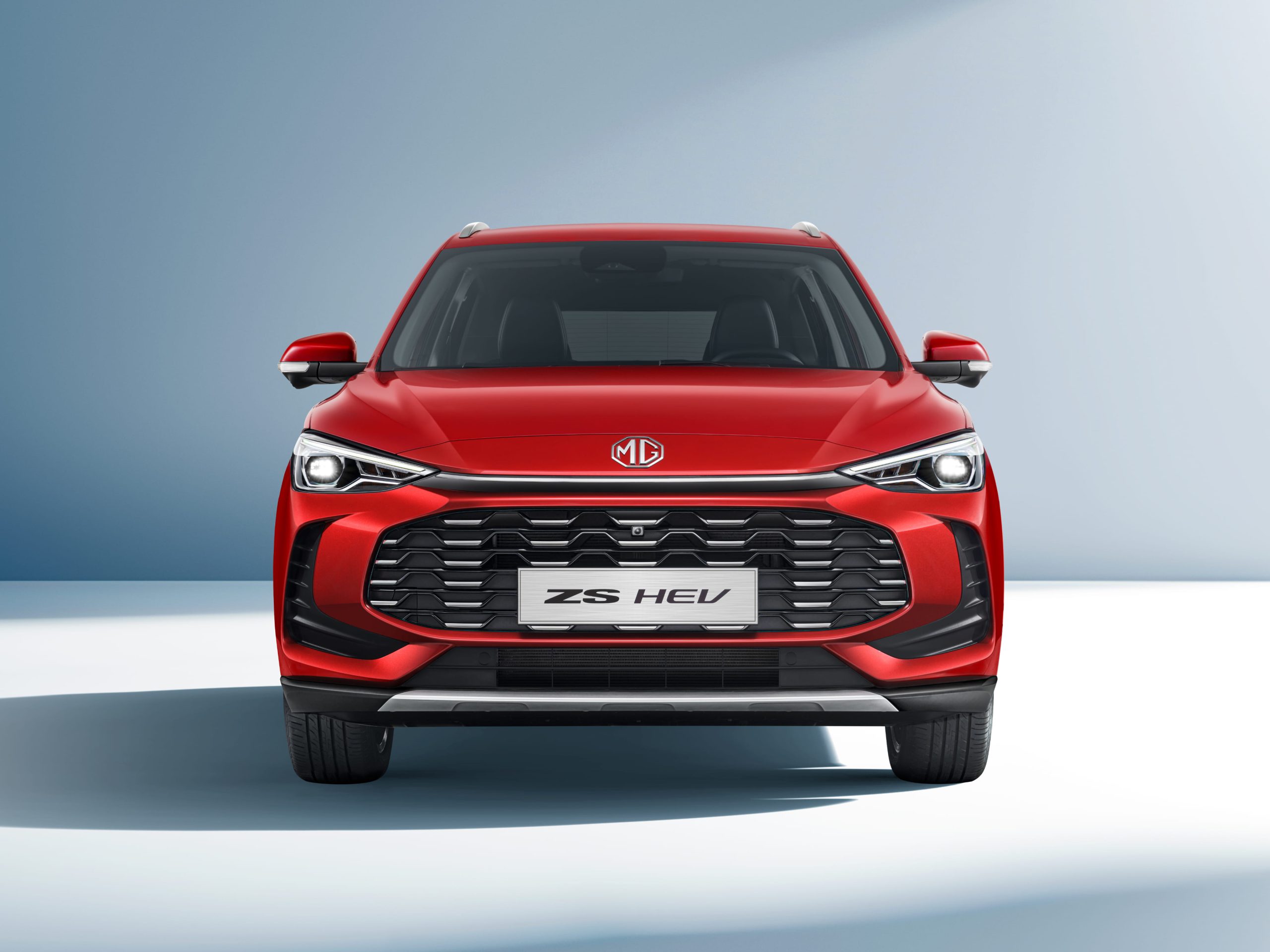 Front view of MG ZS Hybrid+ in red
